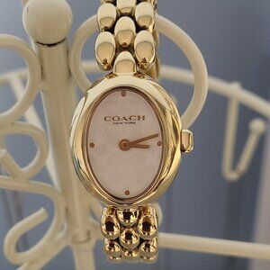 Coach Gold-Tone Oval Bracelet Watch with Pink Mother-of-Pearl Dial